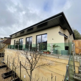 Somerset Villa in Bath with its flat, modern roof and ample glass doors and windows for maximum natural light.